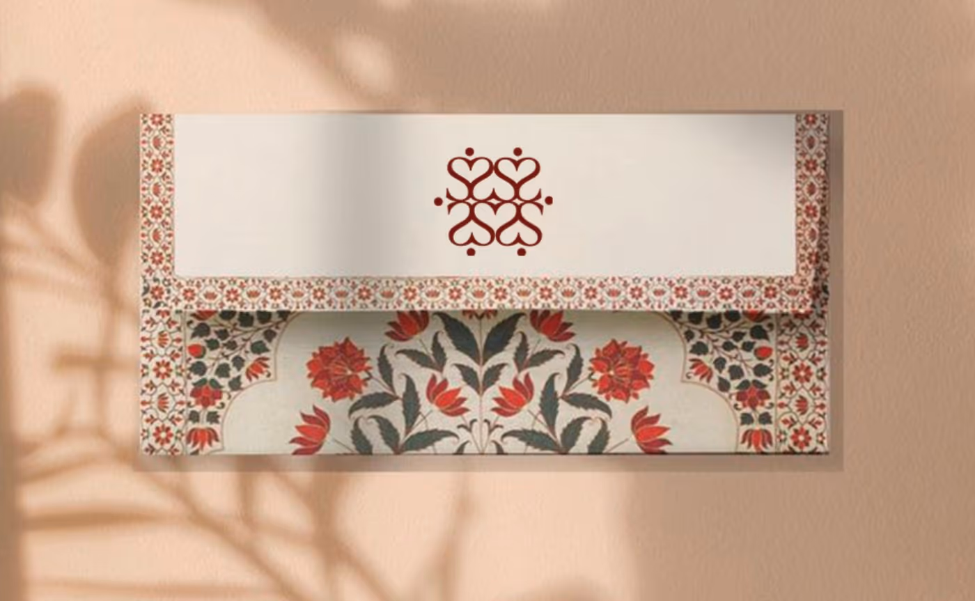 Sikarwaar's burgundy invitation stationery